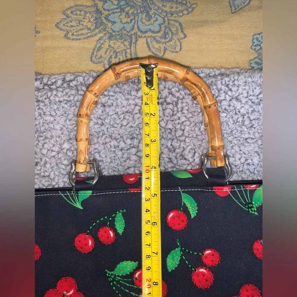 Black purse with red cherries and bamboo handles large